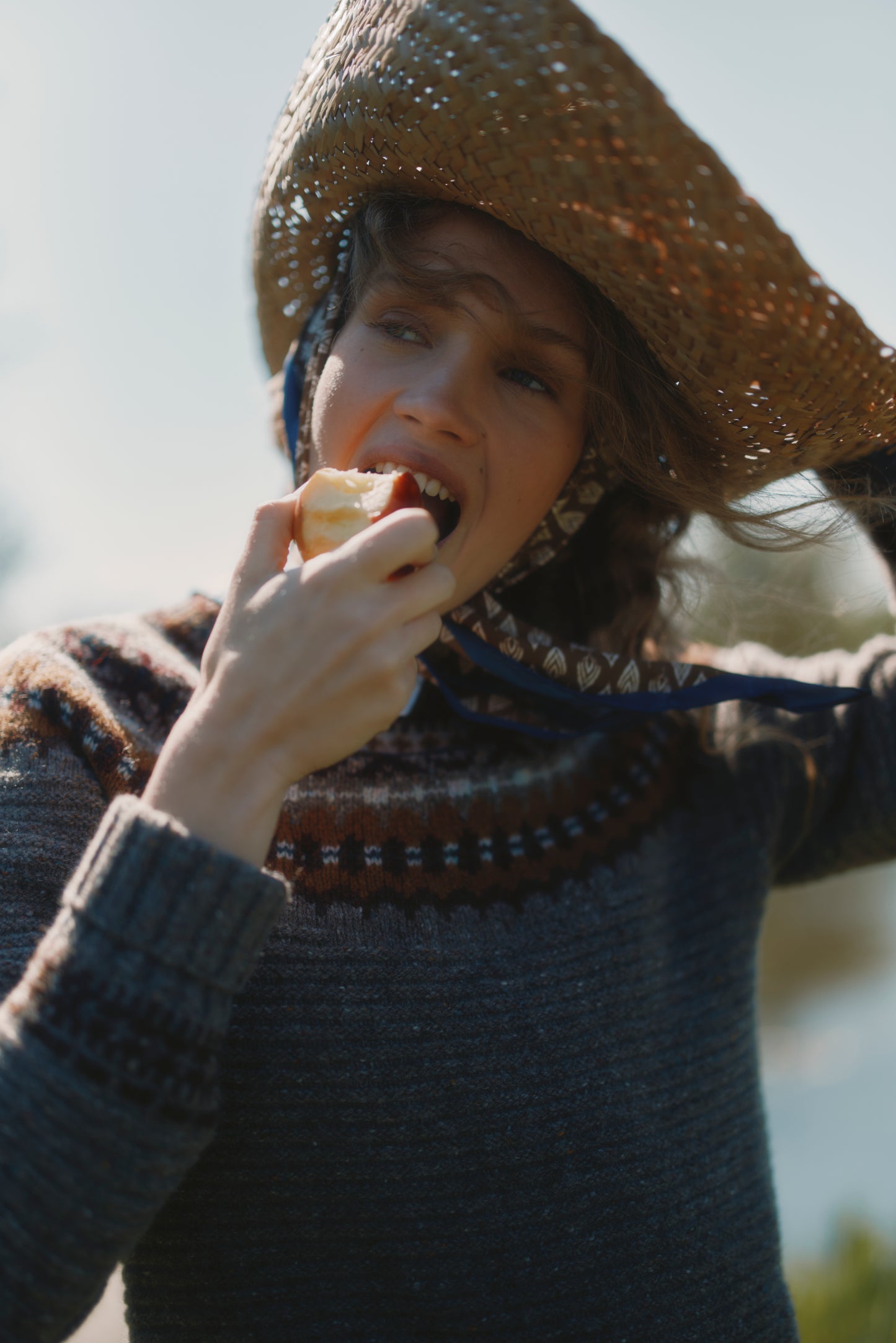Model wearing a Bosie Knitwear Cottage Fair Isle Glenugie Nep Women's Sweater in colour Torridon Grey.
