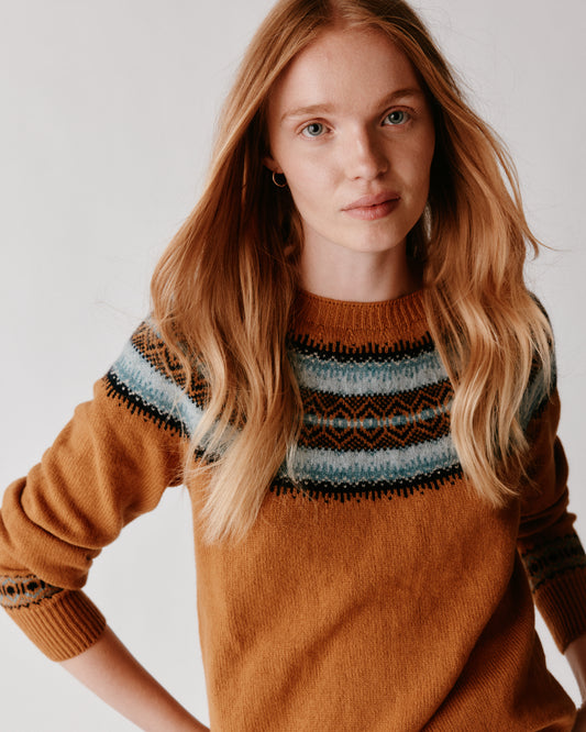 A model wearing a Bosie Fair Isle Geelong Women's Sweater in colour Chai