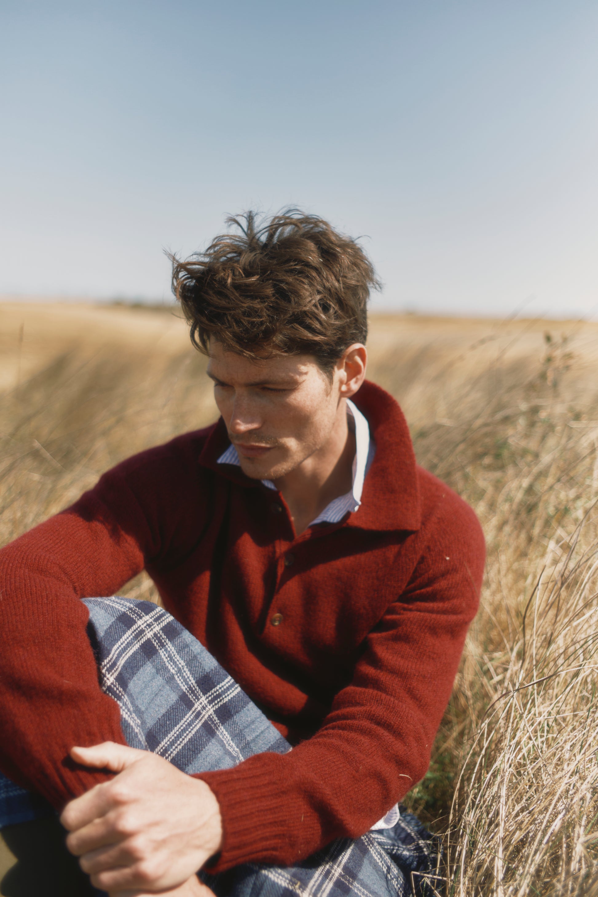 Model wearing a Bosie Knitwear Harley of Scotland Mens Shetland Eton Collar Sweater in colour Bordeaux Mix Burgundy.