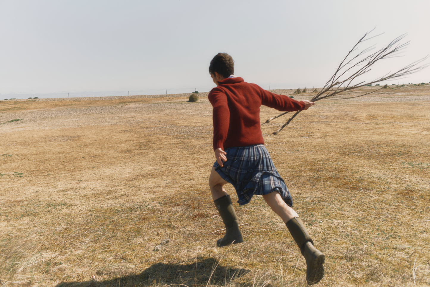 Model wearing a Bosie Knitwear Harley of Scotland Mens Shetland Eton Collar Sweater in colour Bordeaux Mix Burgundy.