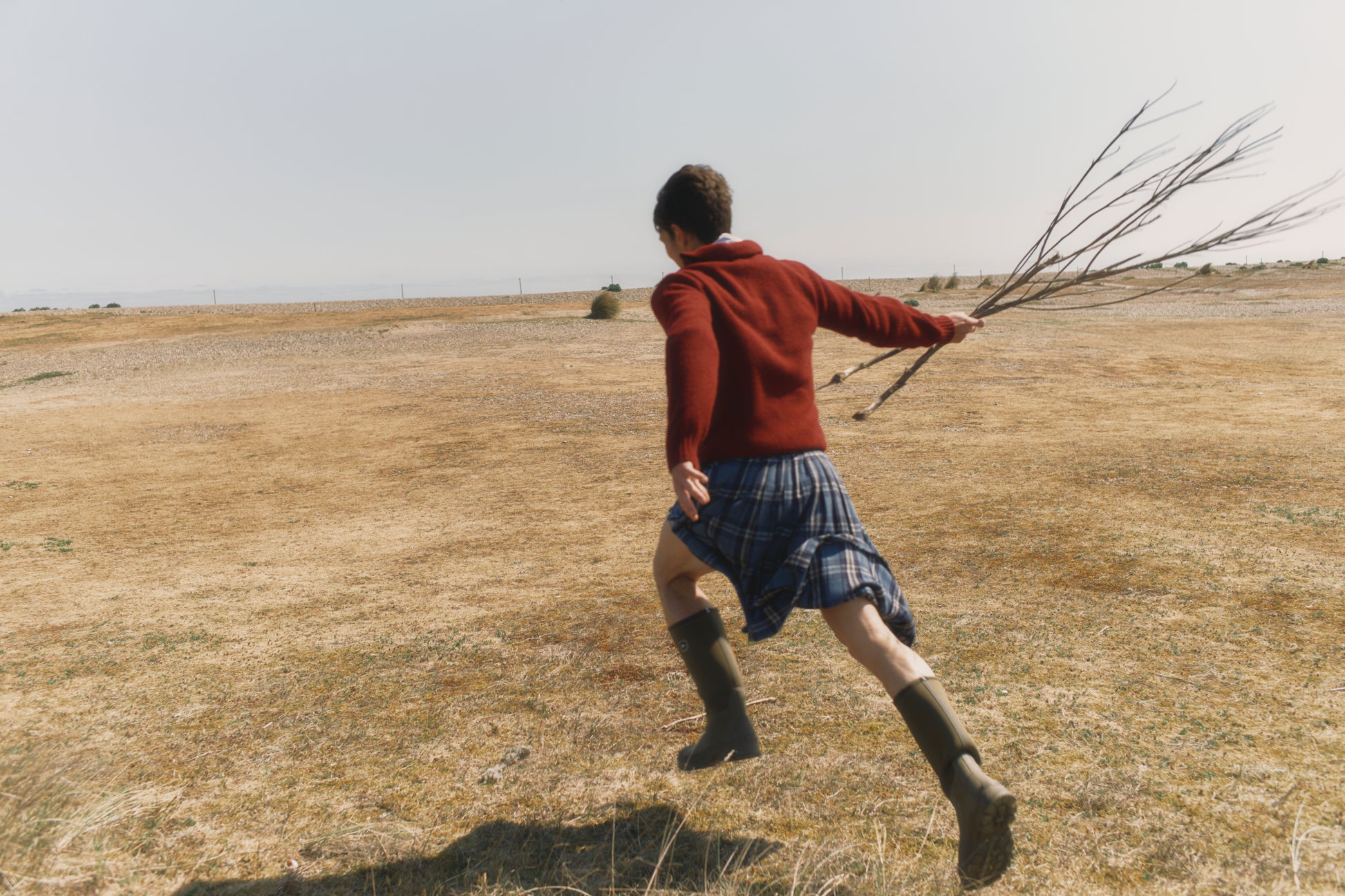 Model wearing a Bosie Knitwear Harley of Scotland Mens Shetland Eton Collar Sweater in colour Bordeaux Mix Burgundy.