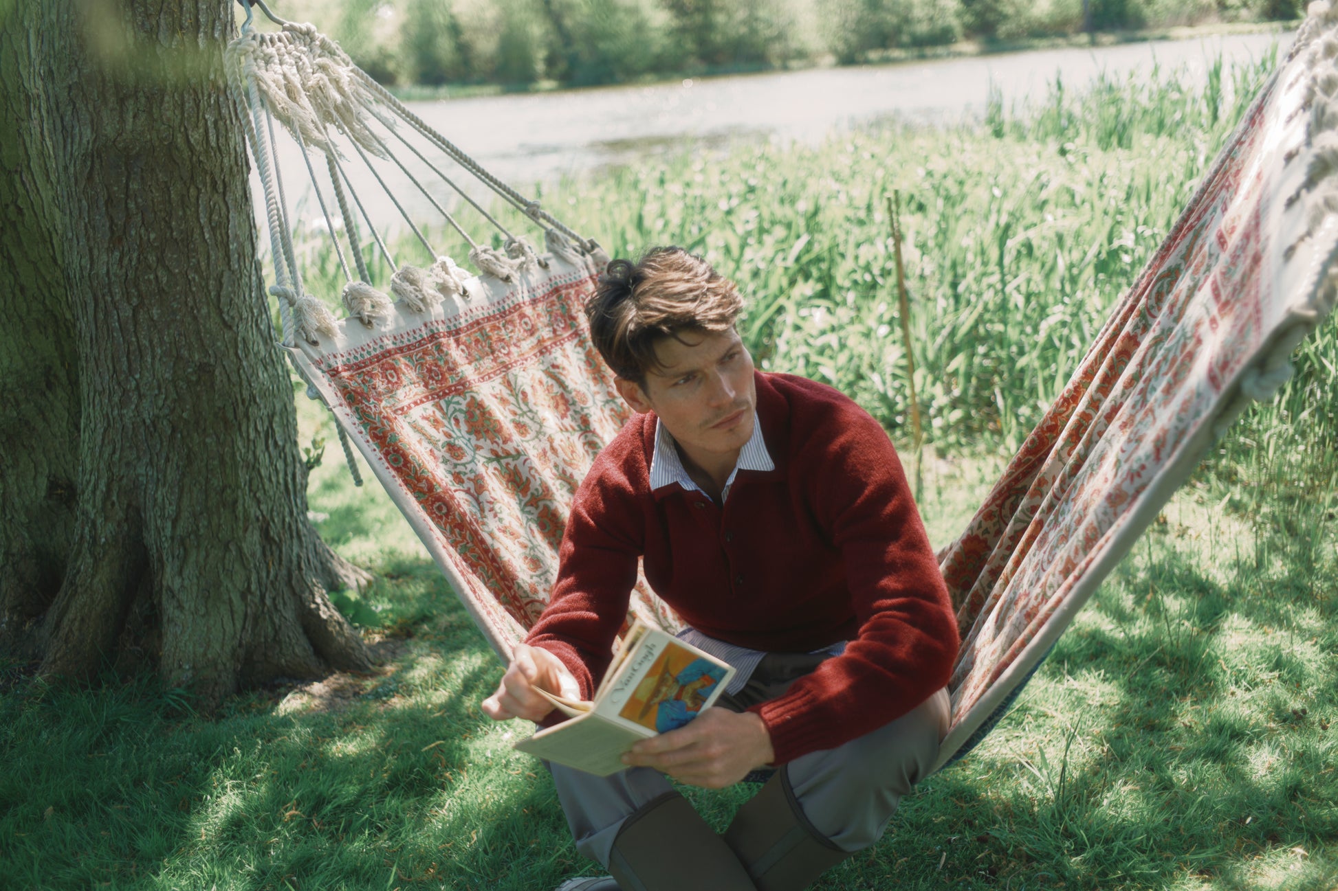 Model wearing a Bosie Knitwear Harley of Scotland Mens Shetland Eton Collar Sweater in colour Bordeaux Mix Burgundy.