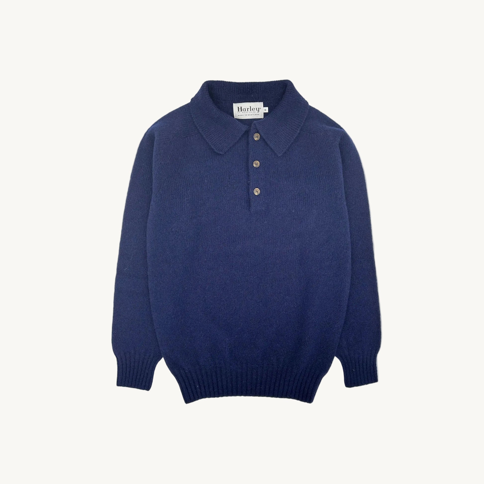 Flatbed photograph of harley of scotland mens shetland eton collar sweater in navy.