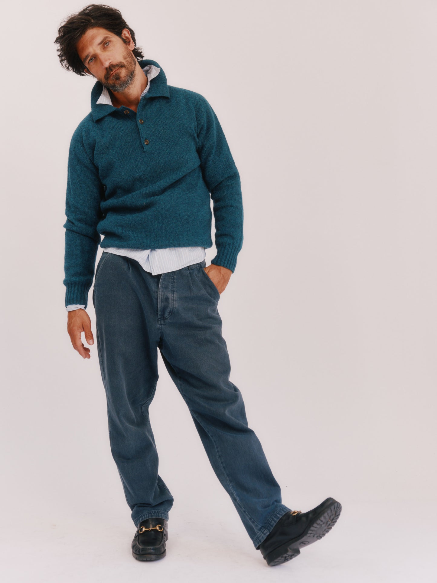 Model wearing a Bosie Knitwear Harley of Scotland Mens Shetland Eton Collar Sweater in colour Storm Dark Teal.