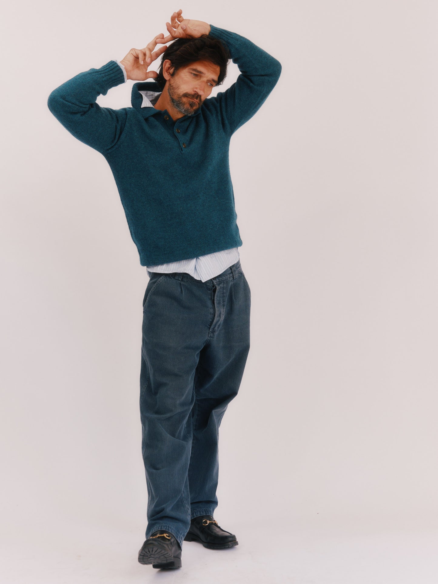 Model wearing a Bosie Knitwear Harley of Scotland Mens Shetland Eton Collar Sweater in colour Storm Dark Teal.