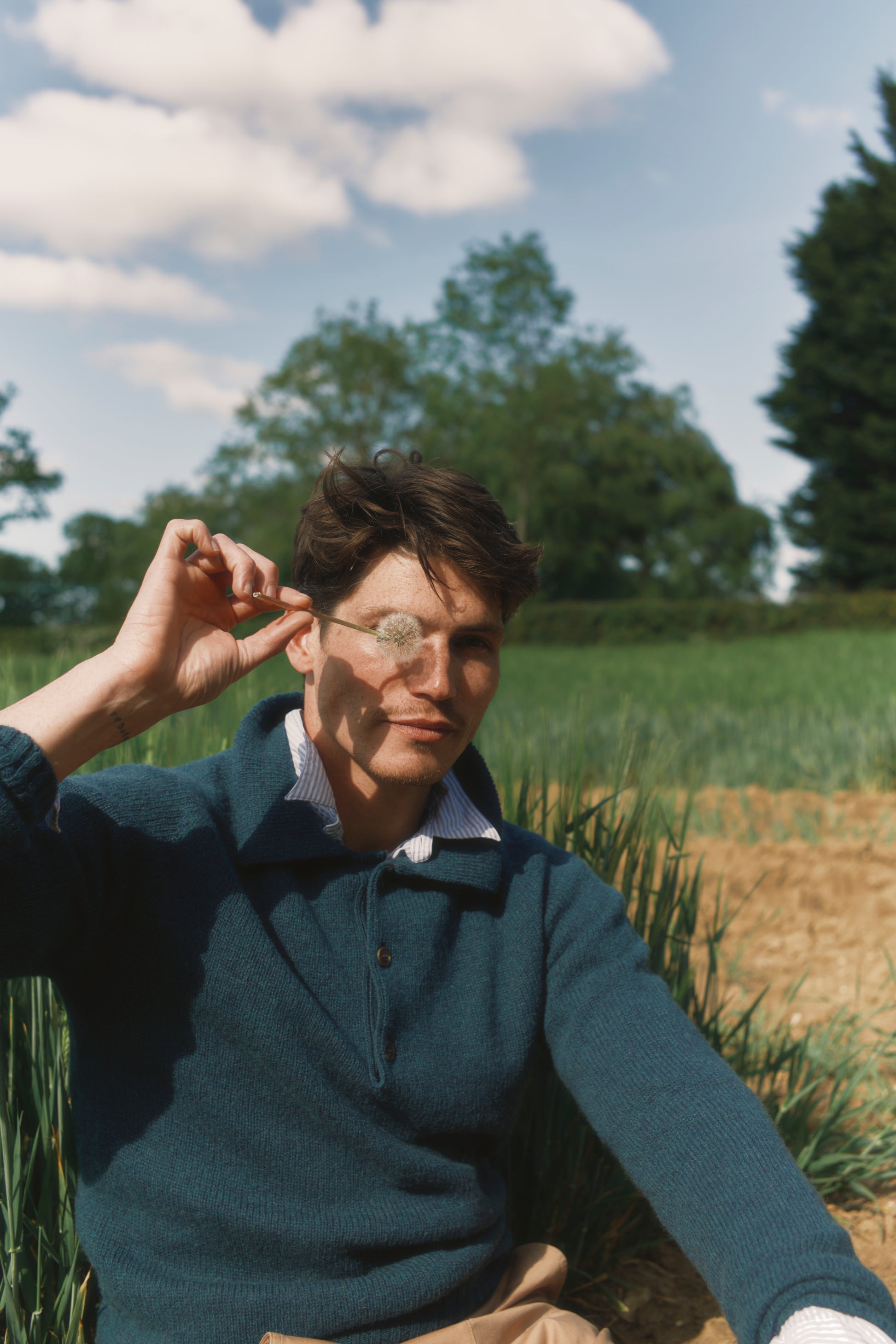 Model wearing a Bosie Knitwear Harley of Scotland Mens Shetland Eton Collar Sweater in colour Storm Dark Teal.