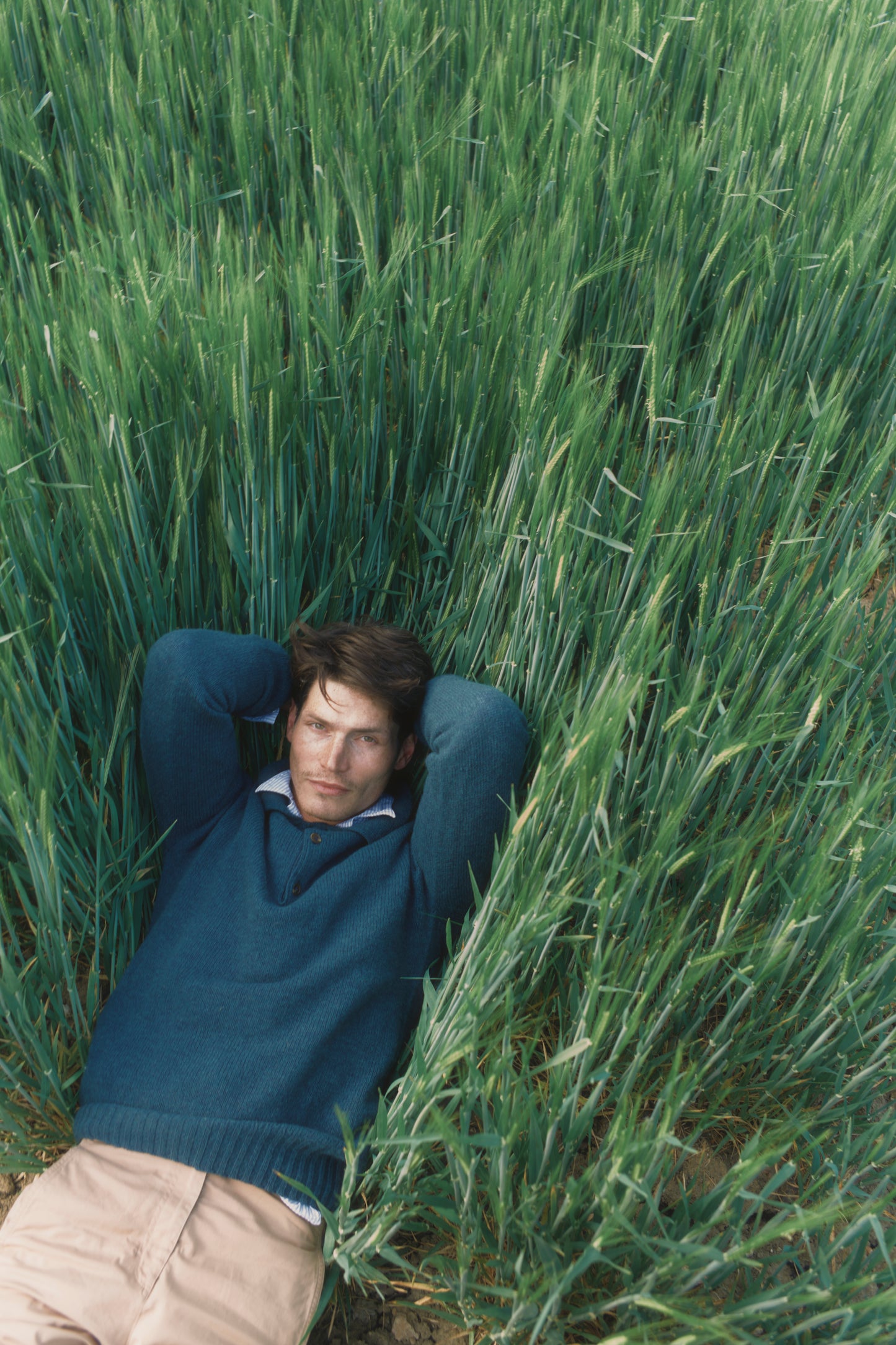 Model wearing a Bosie Knitwear Harley of Scotland Mens Shetland Eton Collar Sweater in colour Storm Dark Teal.