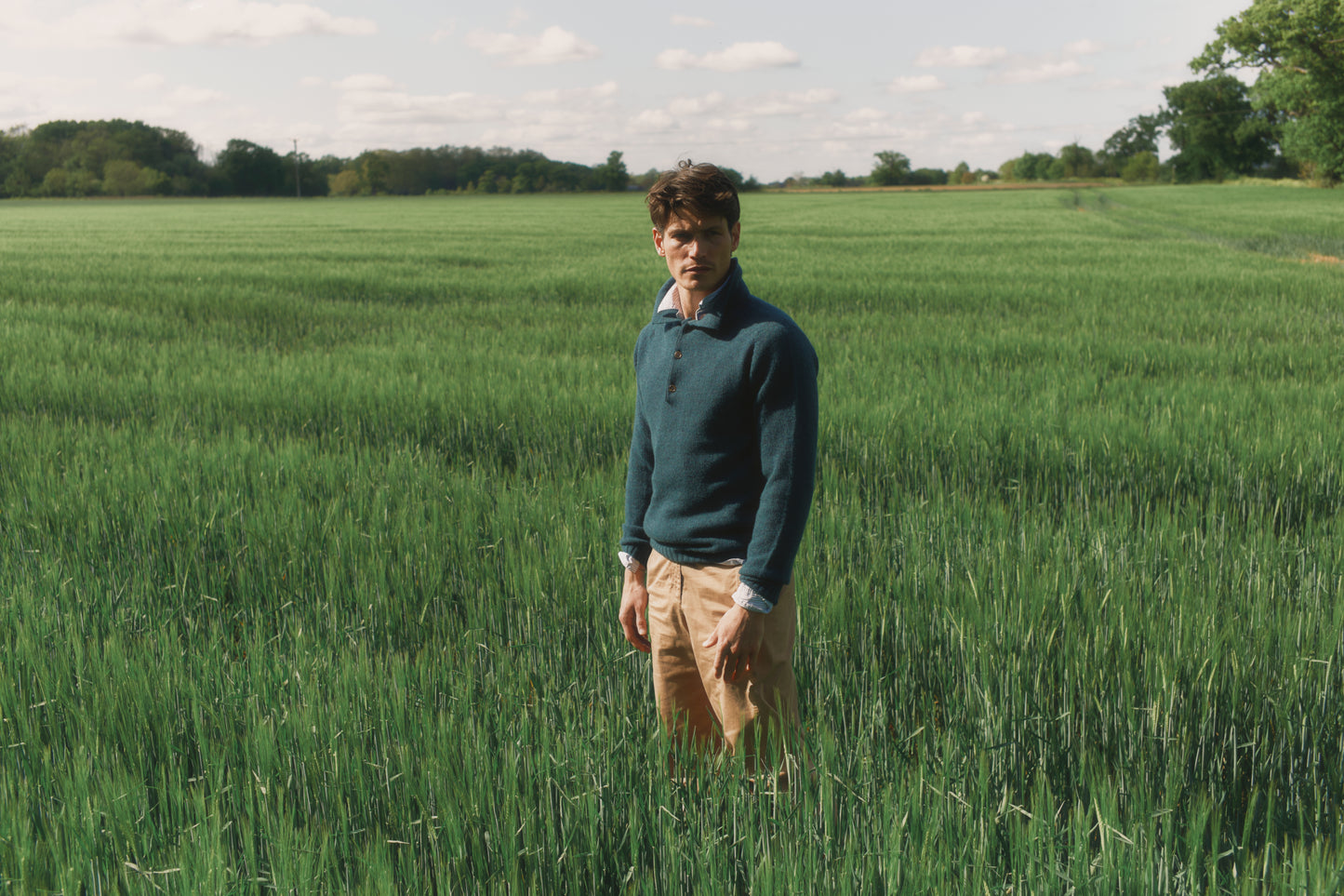 Model wearing a Bosie Knitwear Harley of Scotland Mens Shetland Eton Collar Sweater in colour Storm Dark Teal.