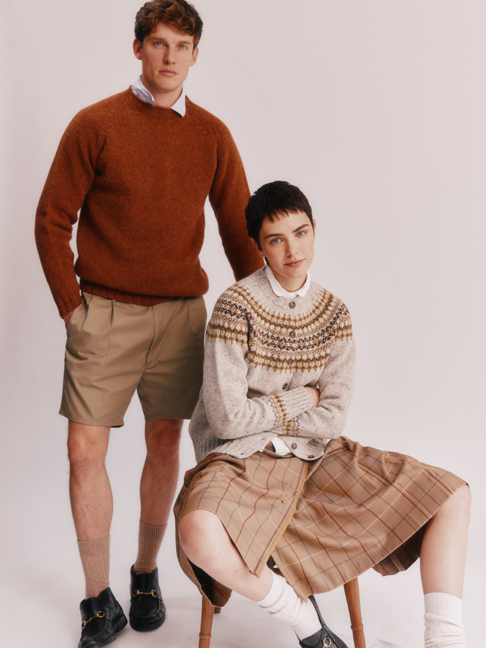 Model wearing a Bosie Knitwear Islander Yoke Fair Isle Glenugie Women's Cardigan in colour Mull Natural.