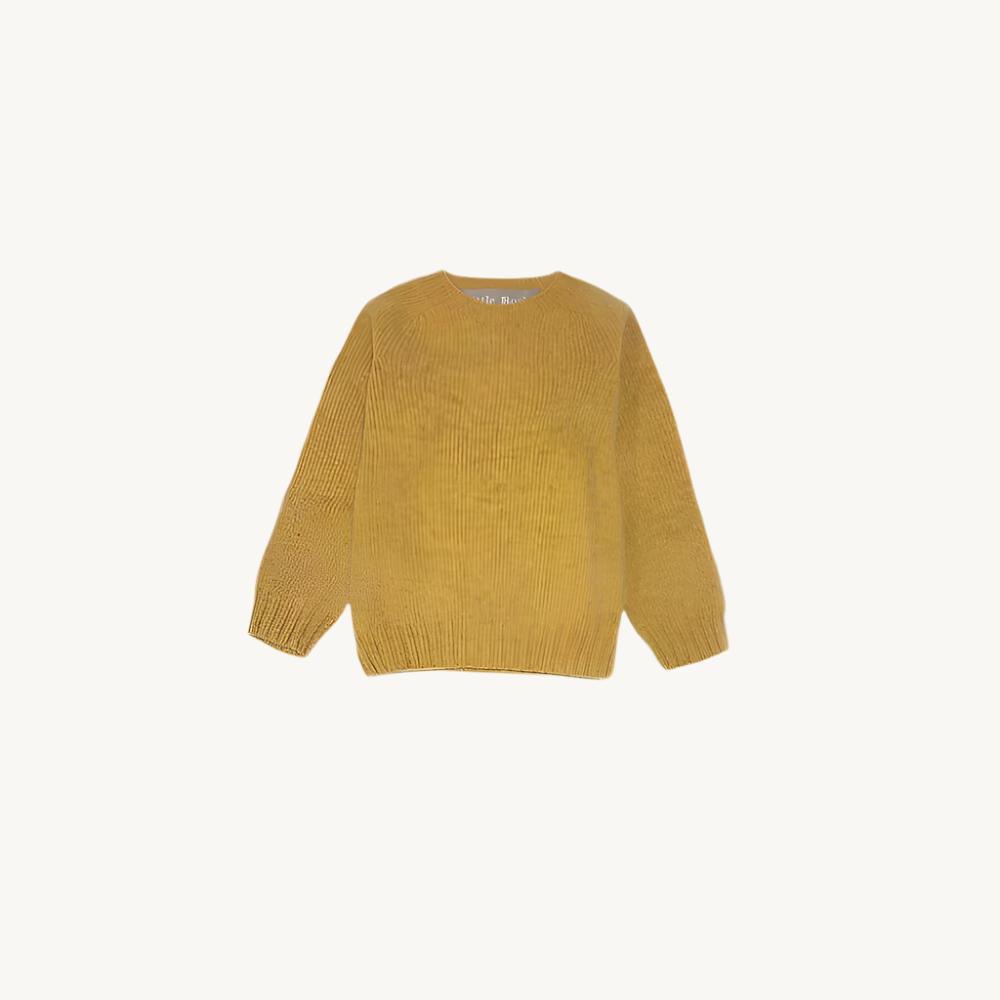 Flatbed photograph of a Bosie Little Bosie Childs Island Shetland Sweater in Marzipan Yellow.