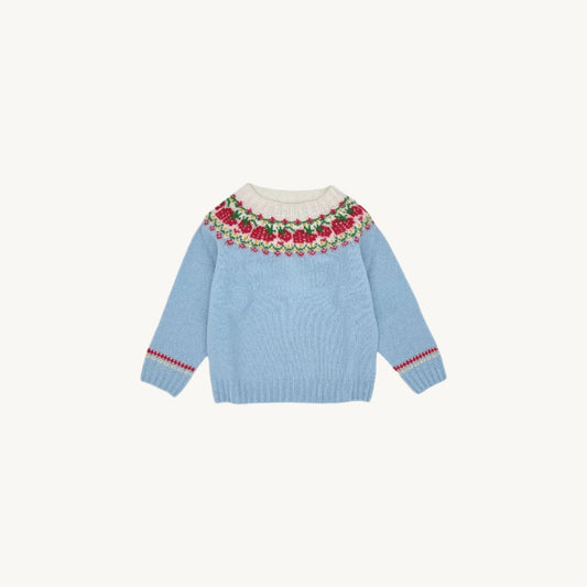 Flatbed photoraph of a Bosie Little Bosie Strawberries Superfine Lambswool Geelong Sweater in colour Baby Blue.