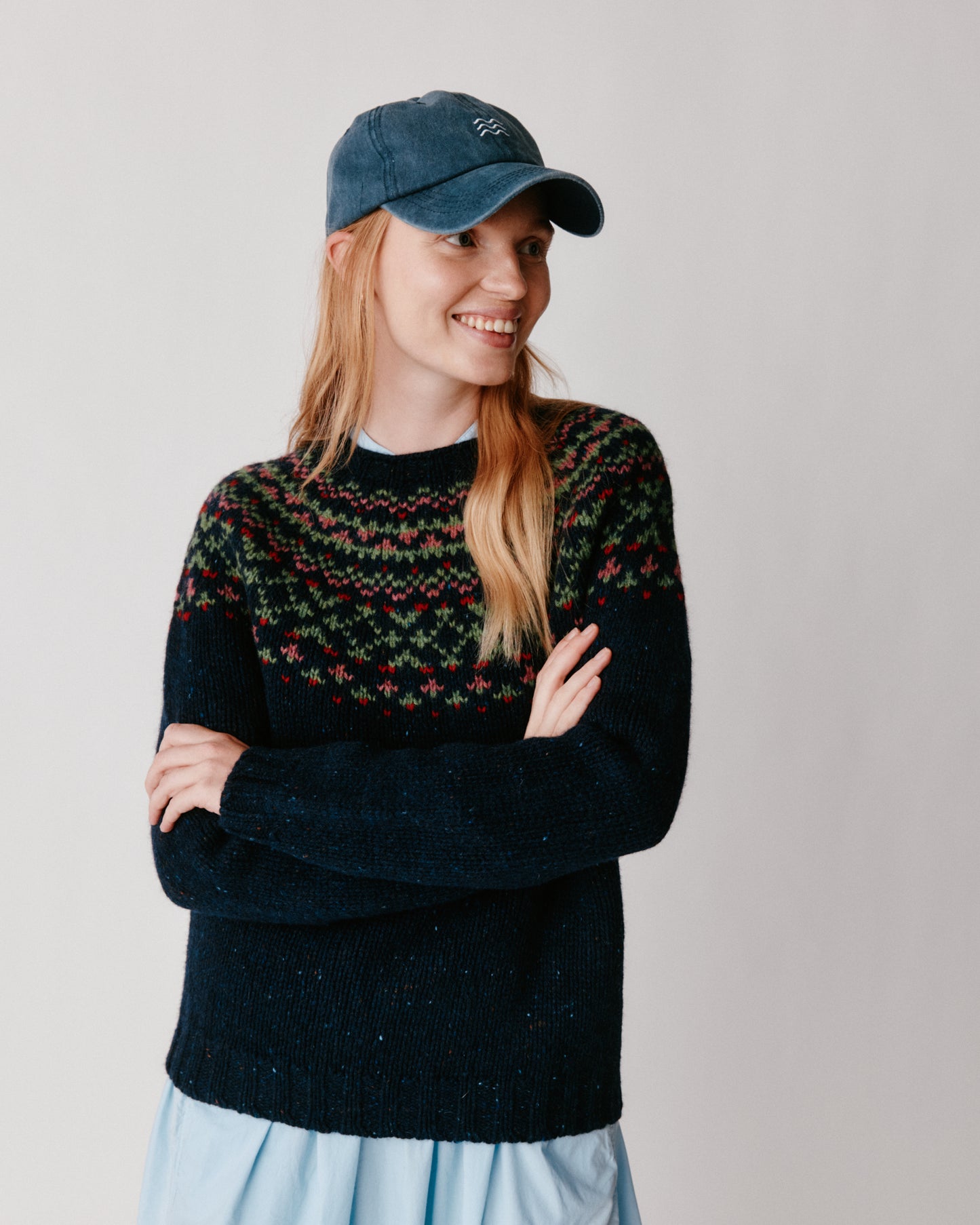 A model wearing a Bosie Luskentyre Chunky Fair Isle Glenugie Nep Women's Sweater in colour Jura