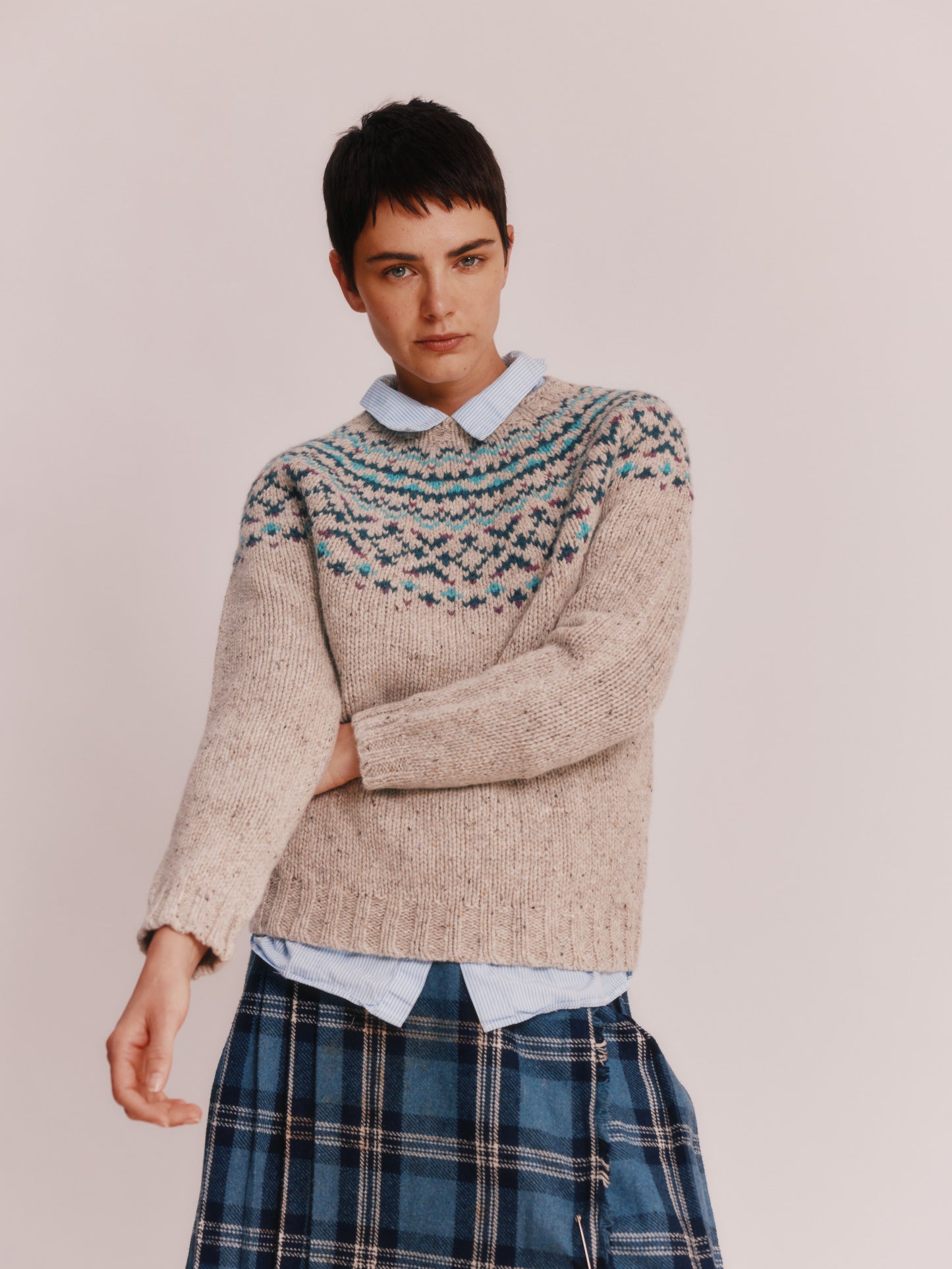 Model wearing a Bosie Knitwear Luskentyre Chunky Fair Isle Glenugie Nep Women's Sweater in  colour Mull Natural.