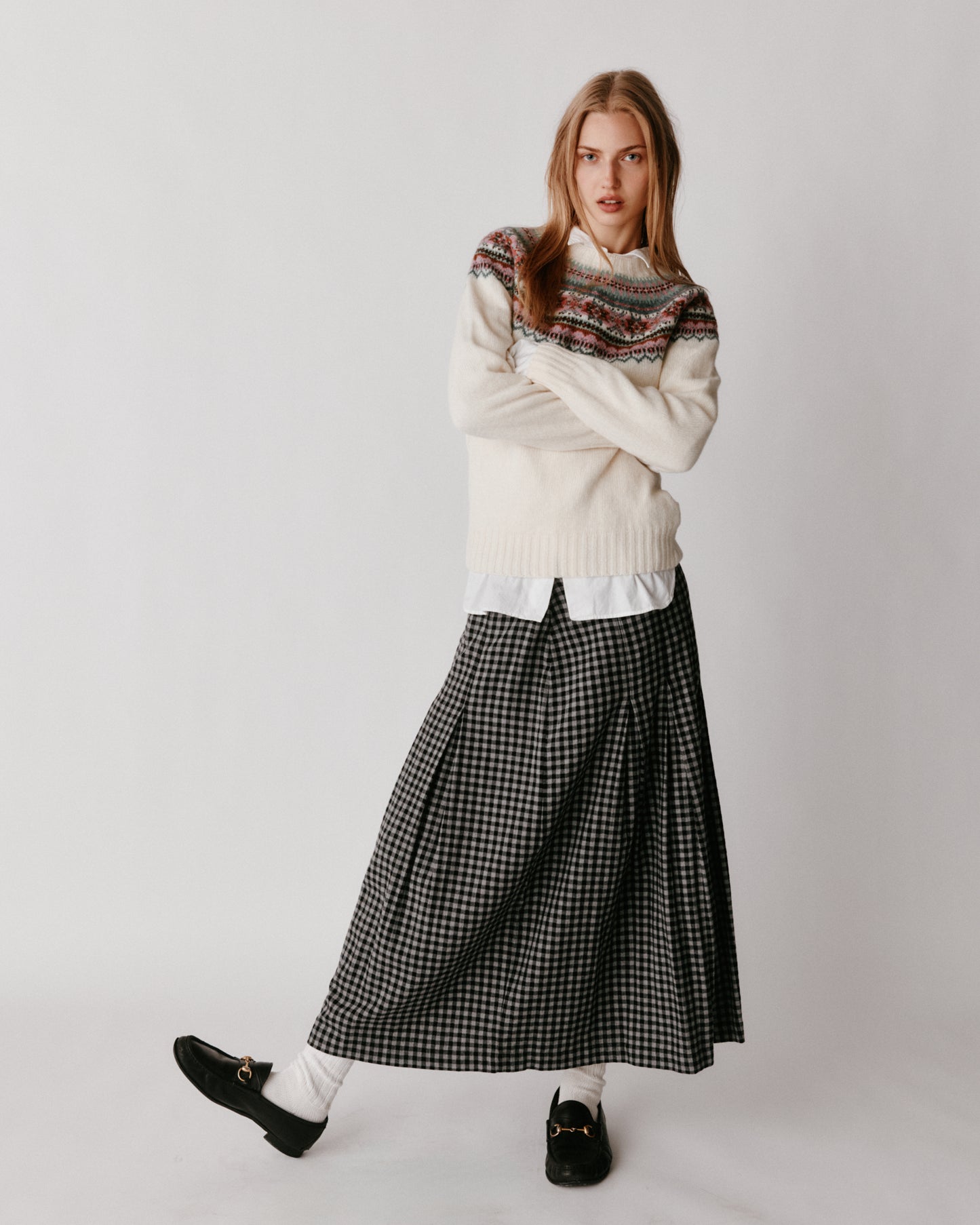 A model wearing a Bosie Sorcha Yoke Fair Isle Women's Sweater in colour White.