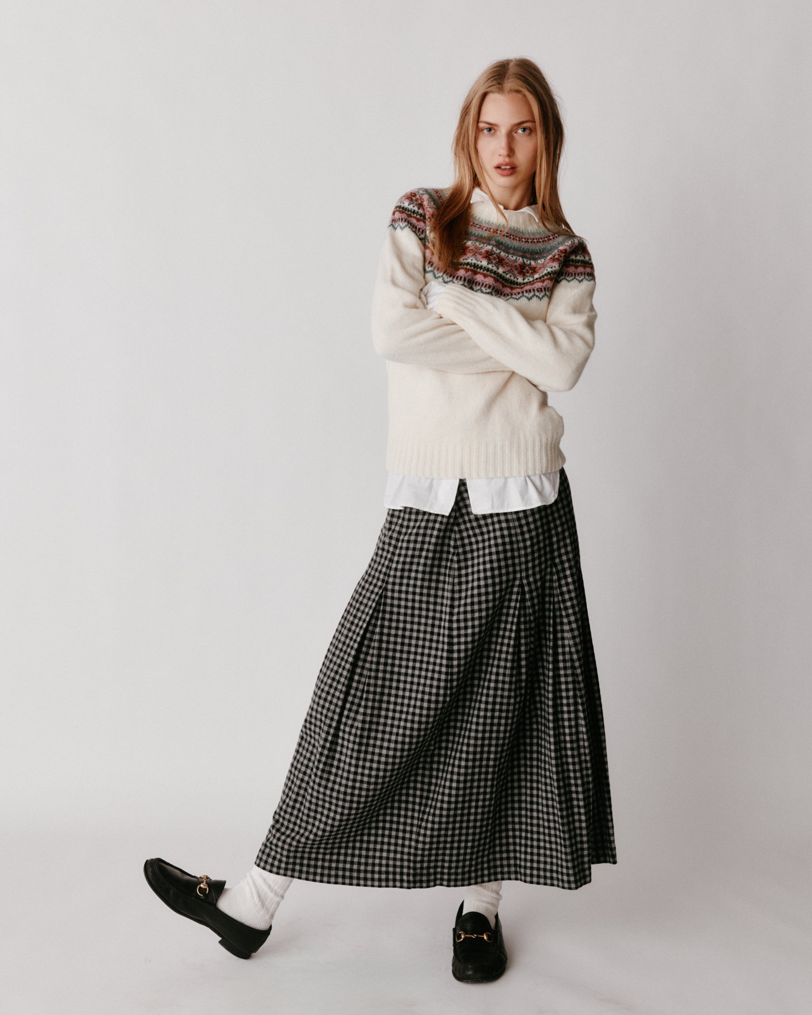 A model wearing a Bosie Sorcha Yoke Fair Isle Women's Sweater in colour White.