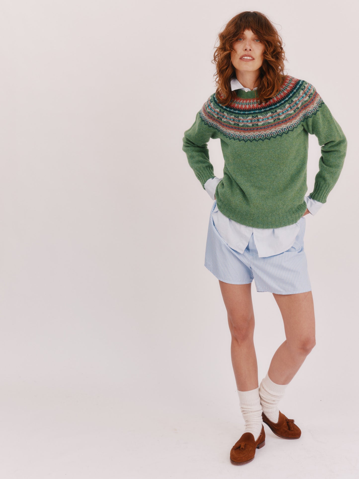 Model wearing a Bosie Knitwear Sorcha Yoke Fair Isle Women's Sweater in colour Baize Green.