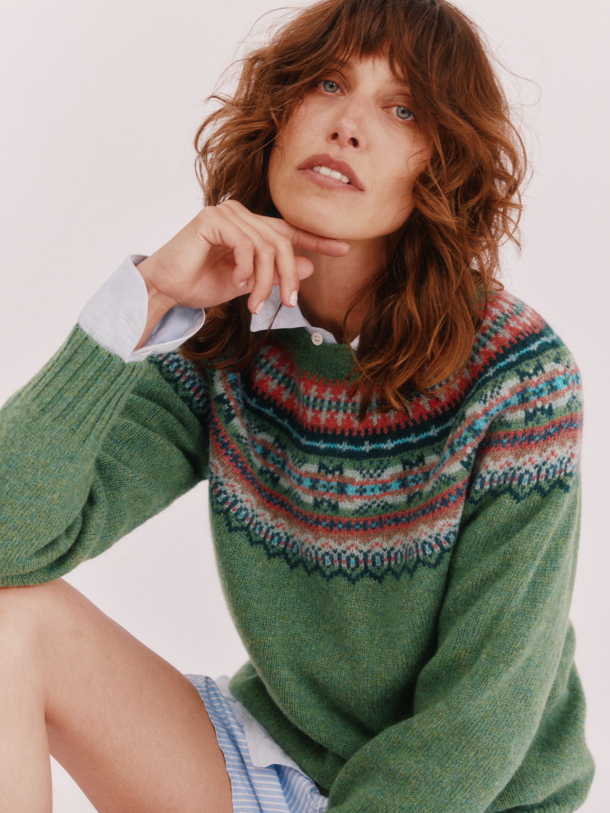 Model wearing a Bosie Knitwear Sorcha Yoke Fair Isle Women's Sweater in colour Baize Green.