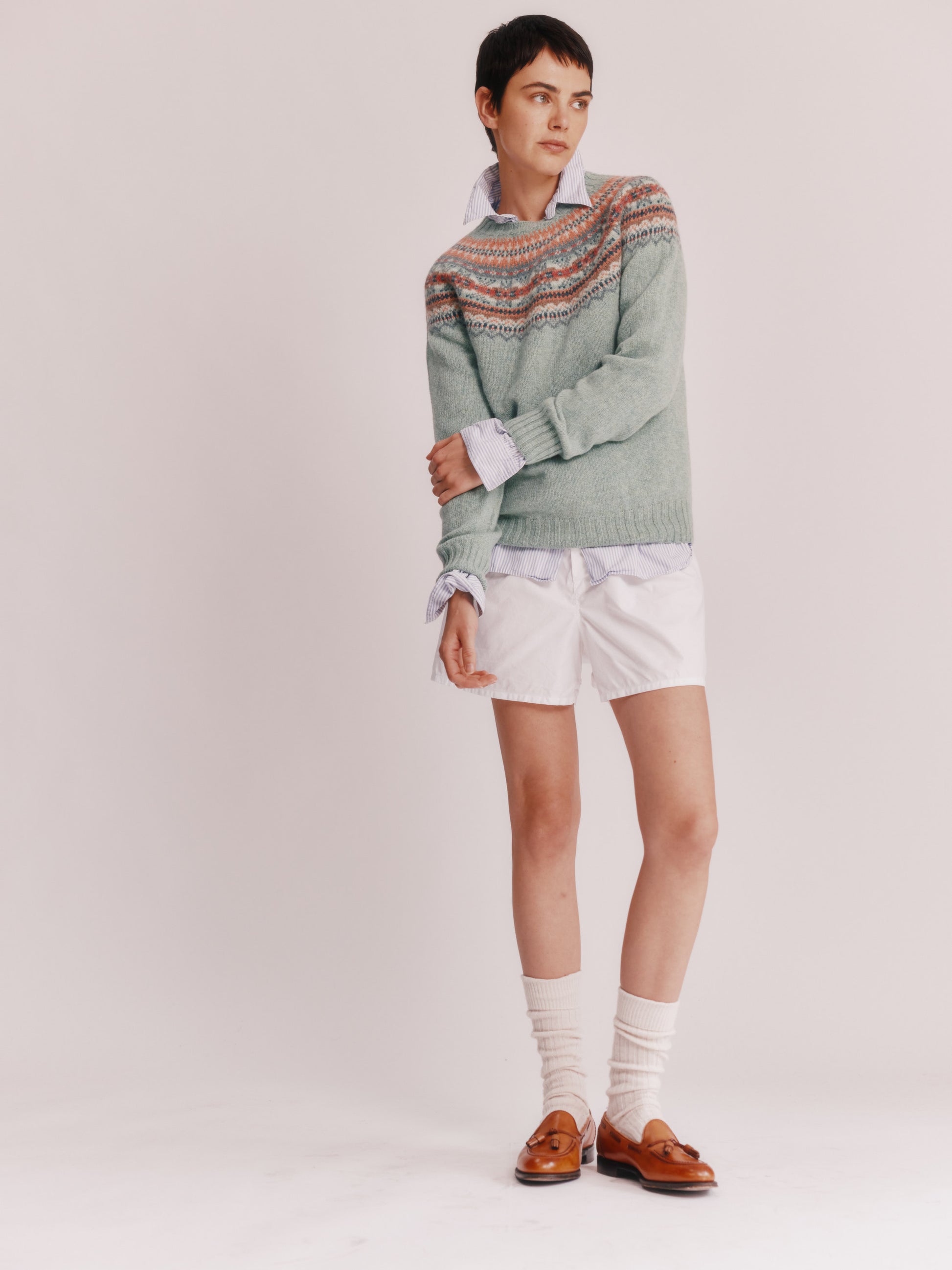 Model wearing a Bosie Knitwear Sorcha Yoke Fair Isle Women's Sweater in colour Fauna Green.