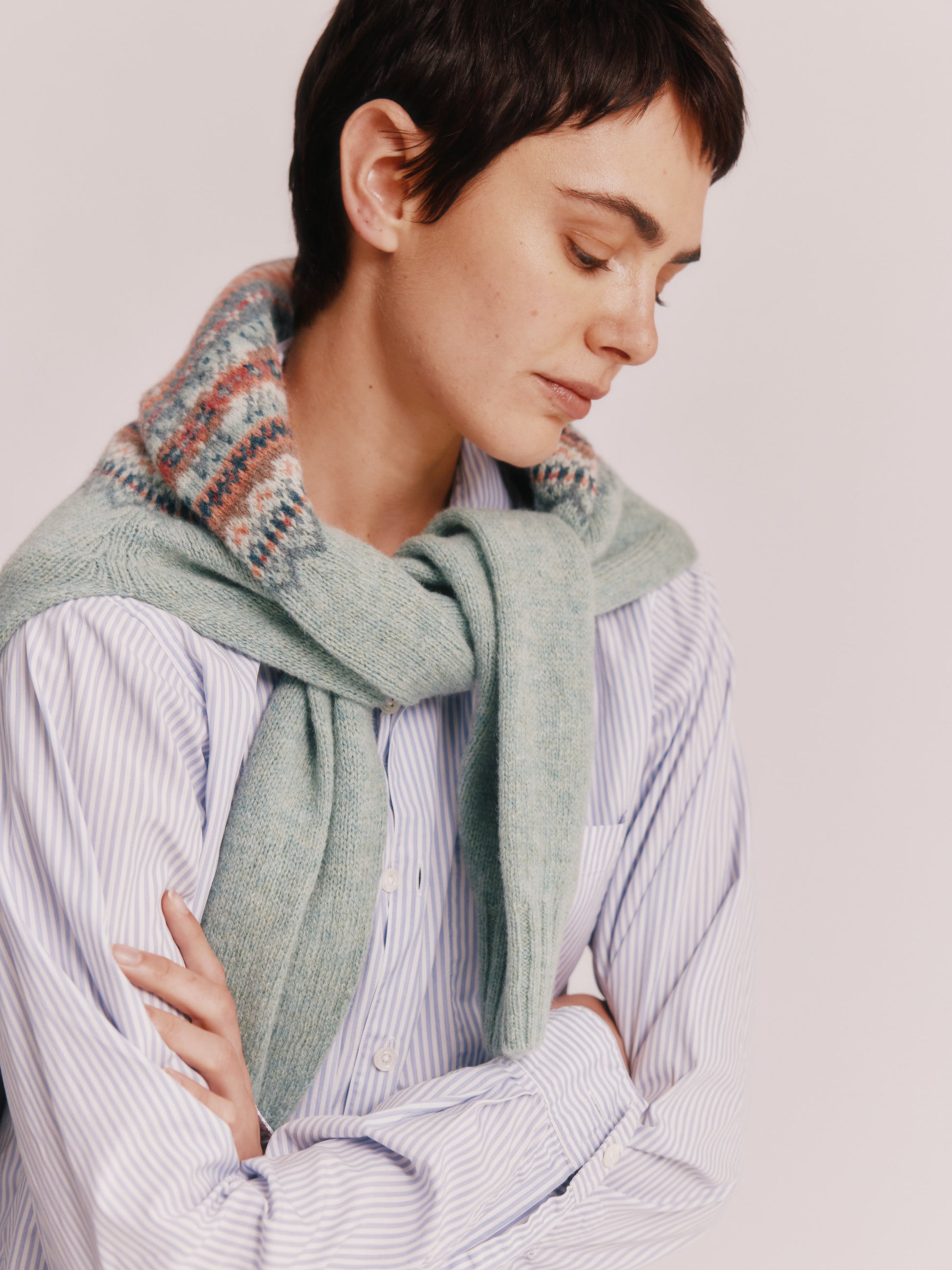 Model wearing a Bosie Knitwear Sorcha Yoke Fair Isle Women's Sweater in colour Fauna Green.