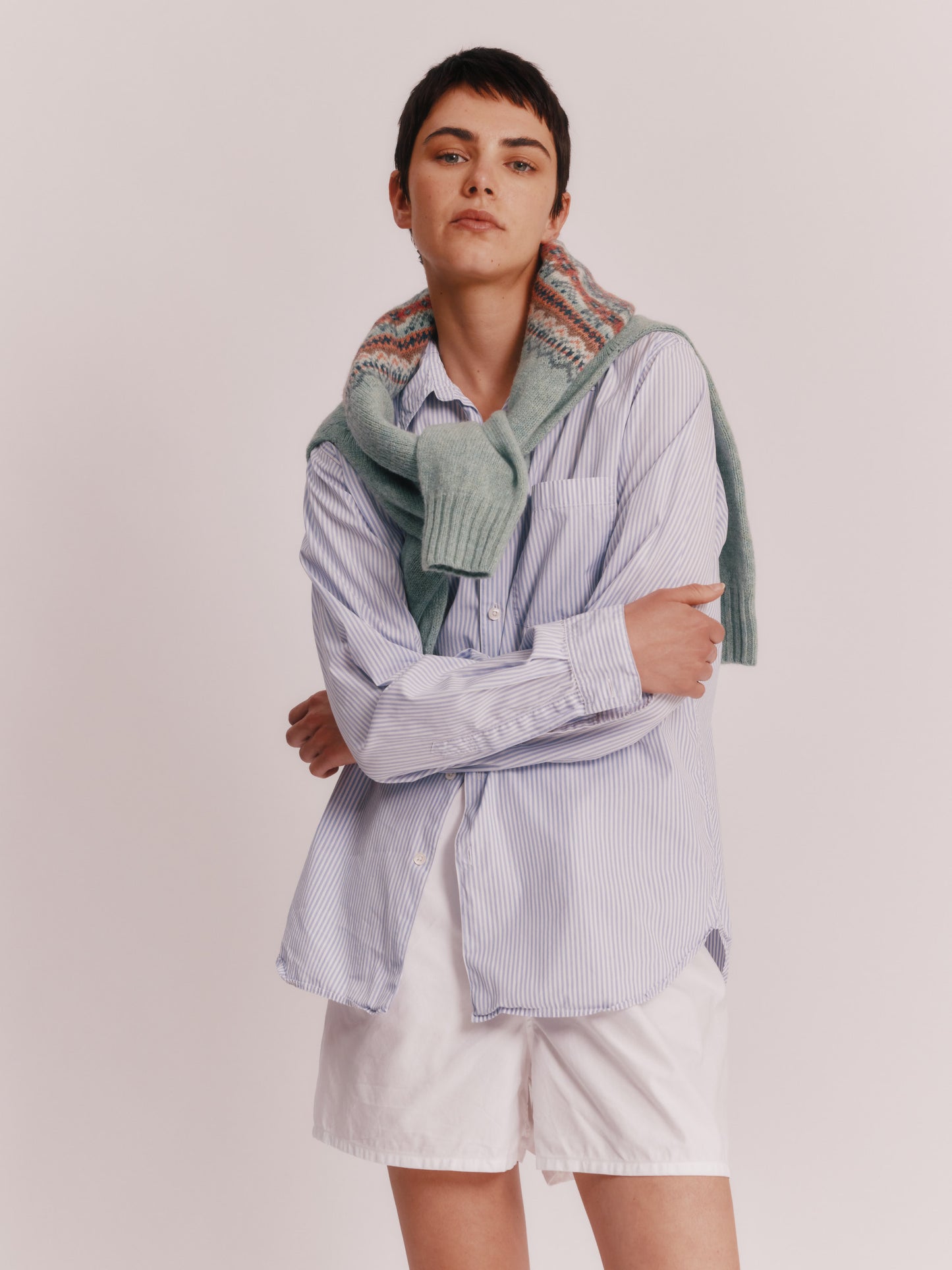 Model wearing a Bosie Knitwear Sorcha Yoke Fair Isle Women's Sweater in colour Fauna Green.