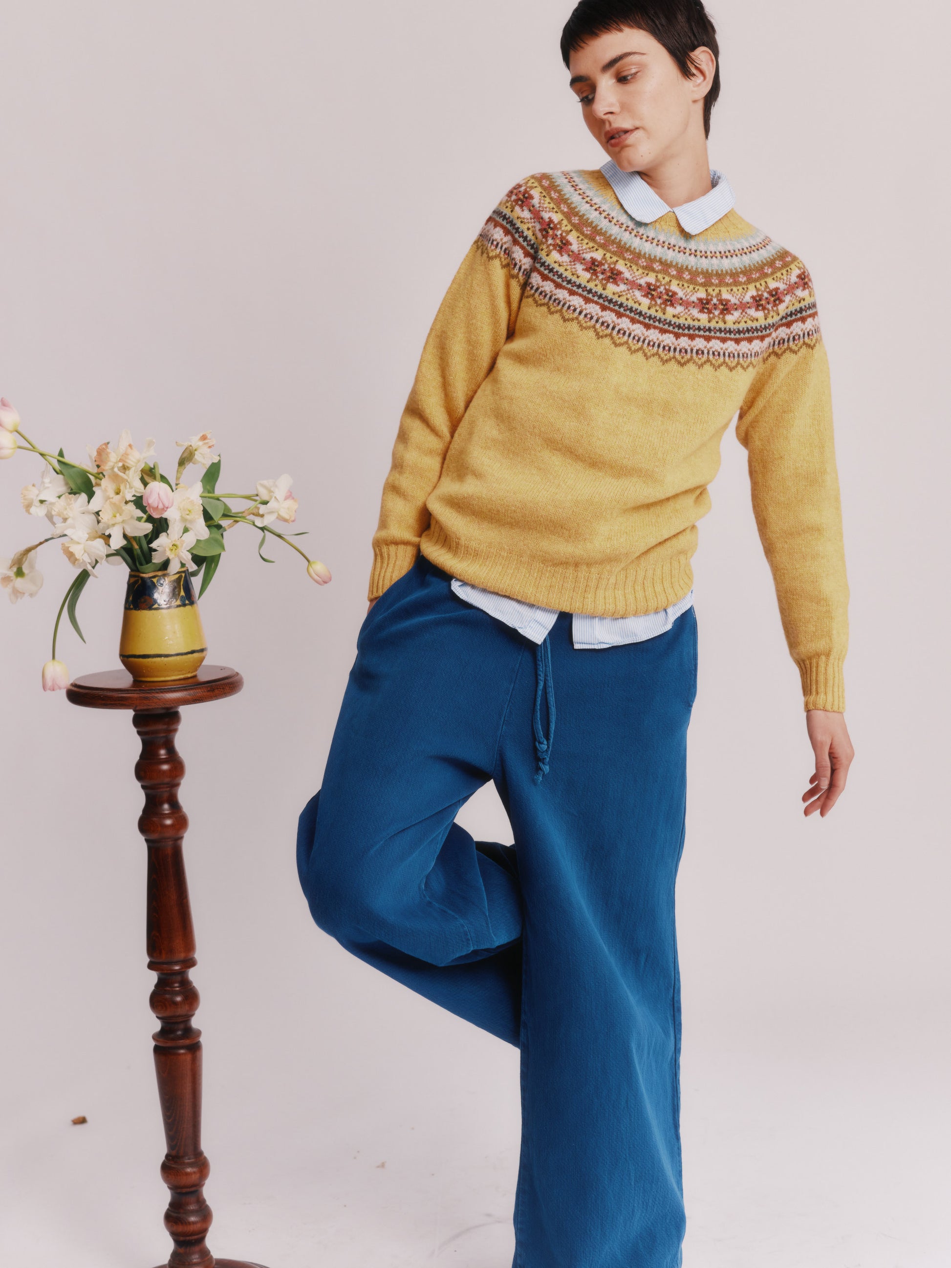 Women wearing a Bosie Knitwear Sorcha Yoke Fair Isle Women's Sweater in colour Marzipan Yellow.