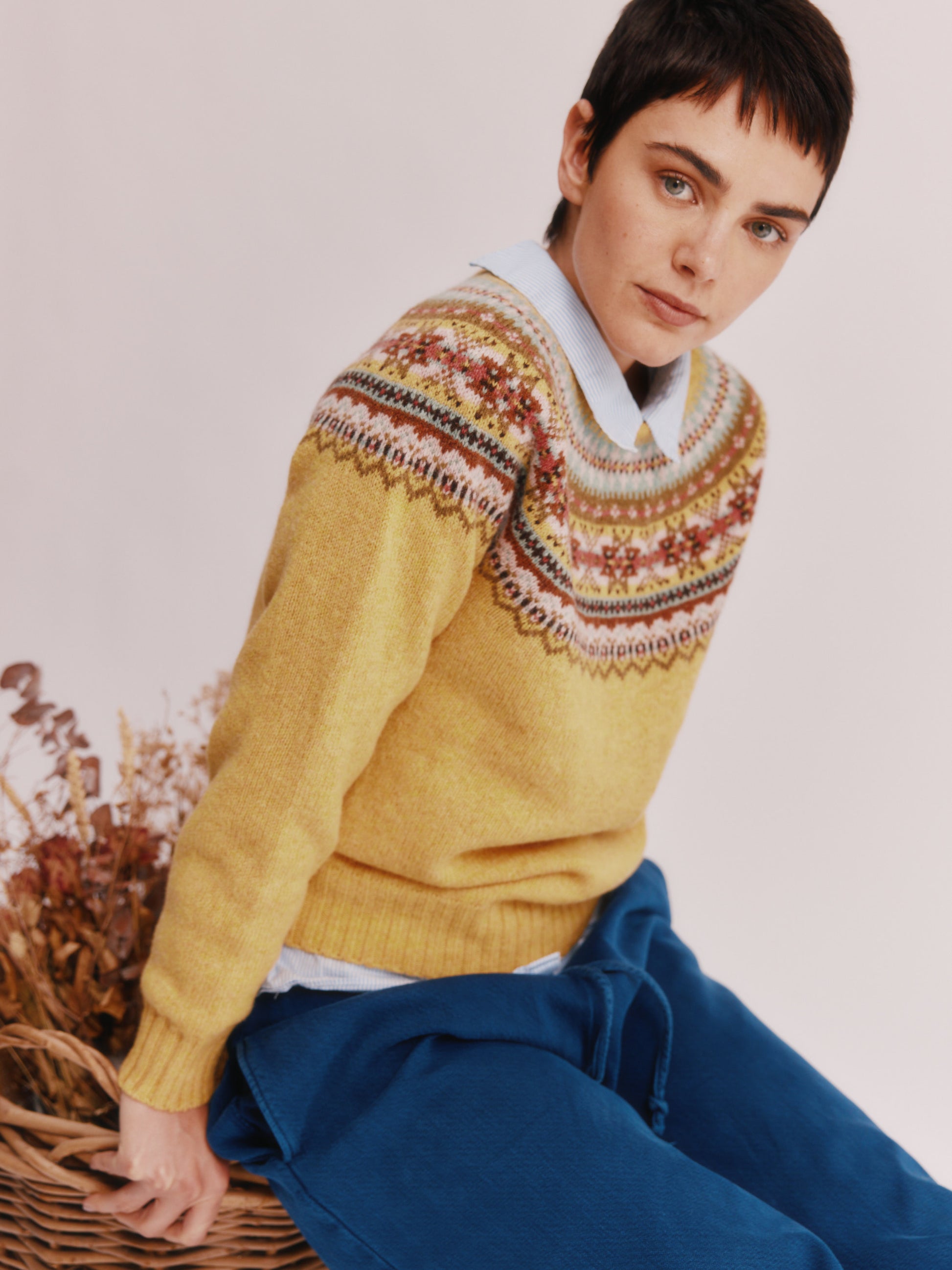 Women wearing a Bosie Knitwear Sorcha Yoke Fair Isle Women's Sweater in colour Marzipan Yellow.