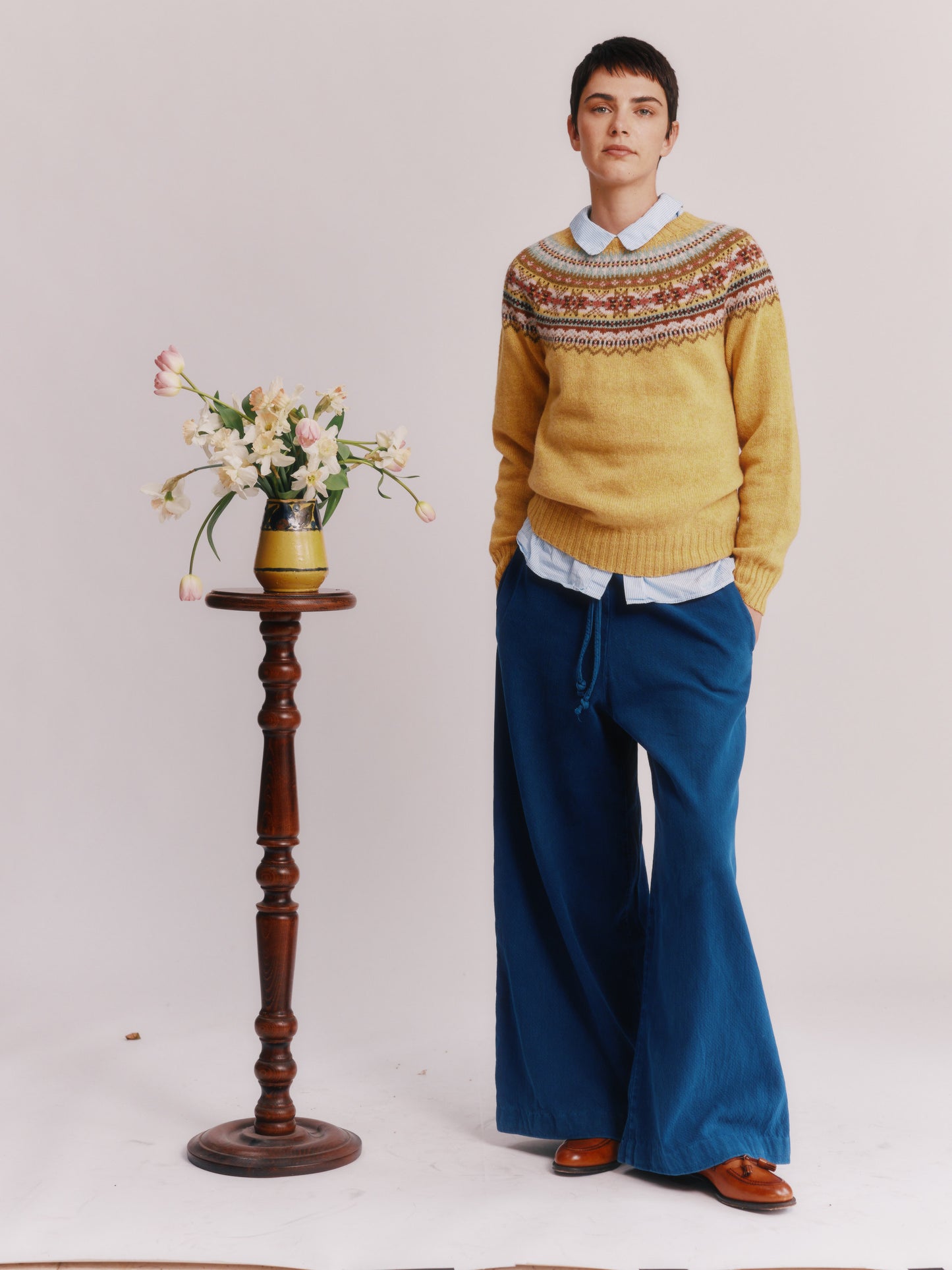 Women wearing a Bosie Knitwear Sorcha Yoke Fair Isle Women's Sweater in colour Marzipan Yellow.
