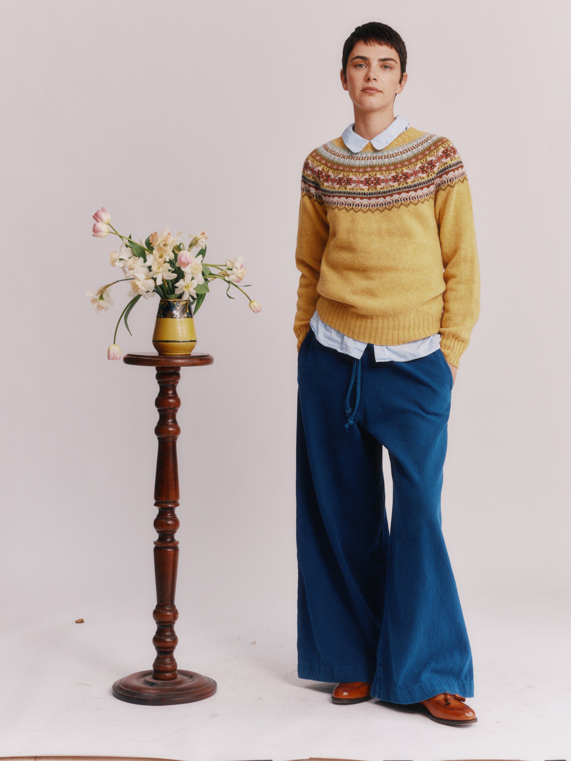 Women wearing a Bosie Knitwear Sorcha Yoke Fair Isle Women's Sweater in colour Marzipan Yellow.