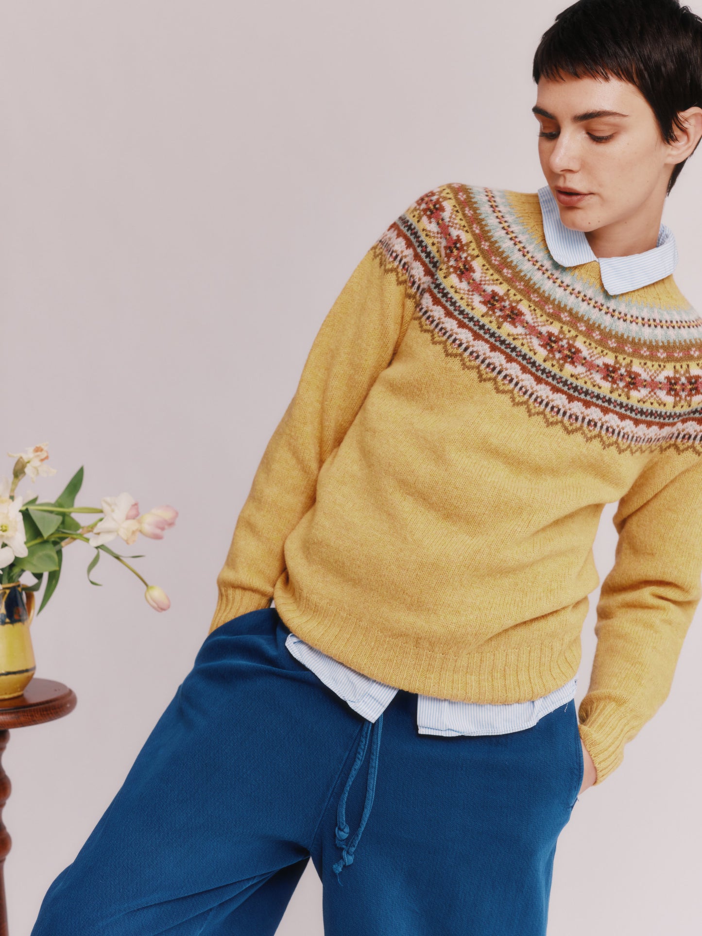 Women wearing a Bosie Knitwear Sorcha Yoke Fair Isle Women's Sweater in colour Marzipan Yellow.