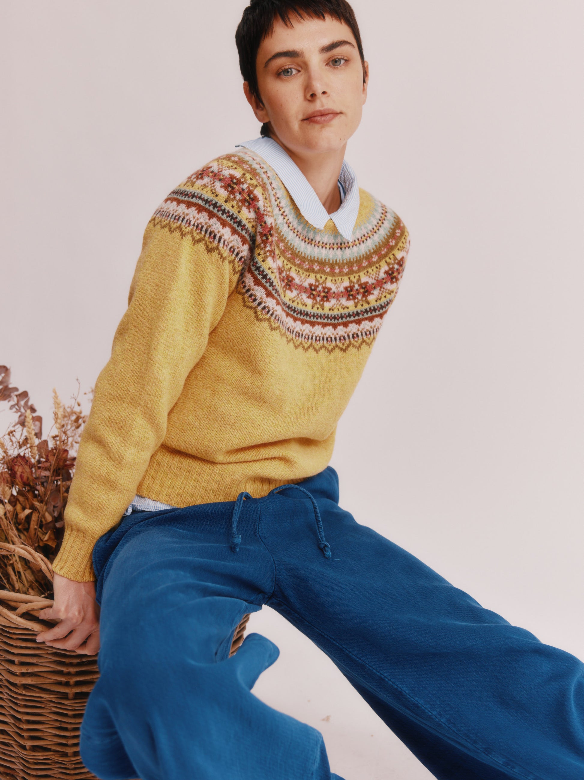Women wearing a Bosie Knitwear Sorcha Yoke Fair Isle Women's Sweater in colour Marzipan Yellow.
