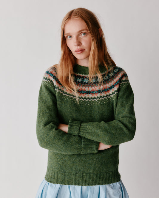 Model wearing the Bosie West Coast Yoke Fair Isle Women's Sweater in Baize – seamless, seam-free pure wool, knitted in Scotland by Harley of Scotland for Bosie Knitwear
