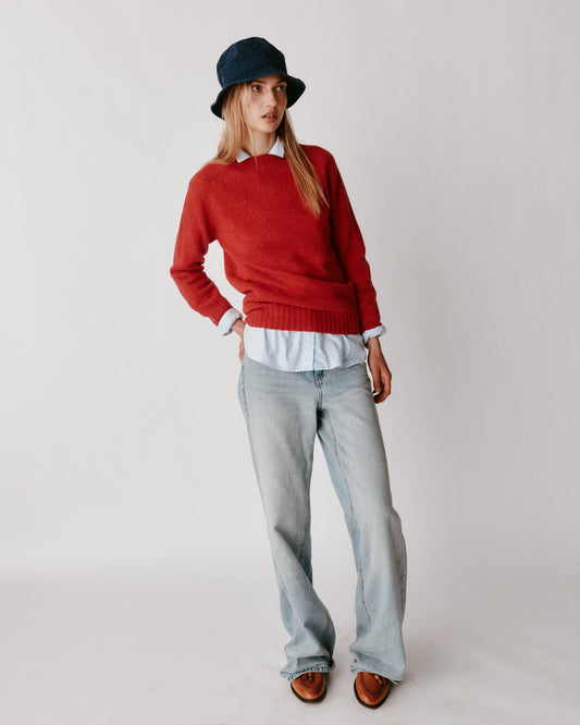 A model wearing a Bosie Womens Harley of Scotland Seamless Saddle Shoulder Shetland Sweater in colour Damask.