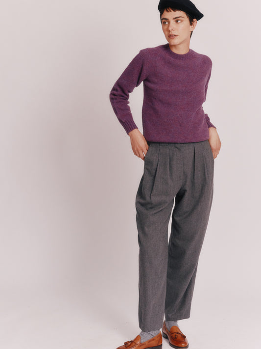 Model wearing a Womens Harley of Scotland Seamless Saddle Shoulder Shetland Sweater  in colour Calluna Purple.