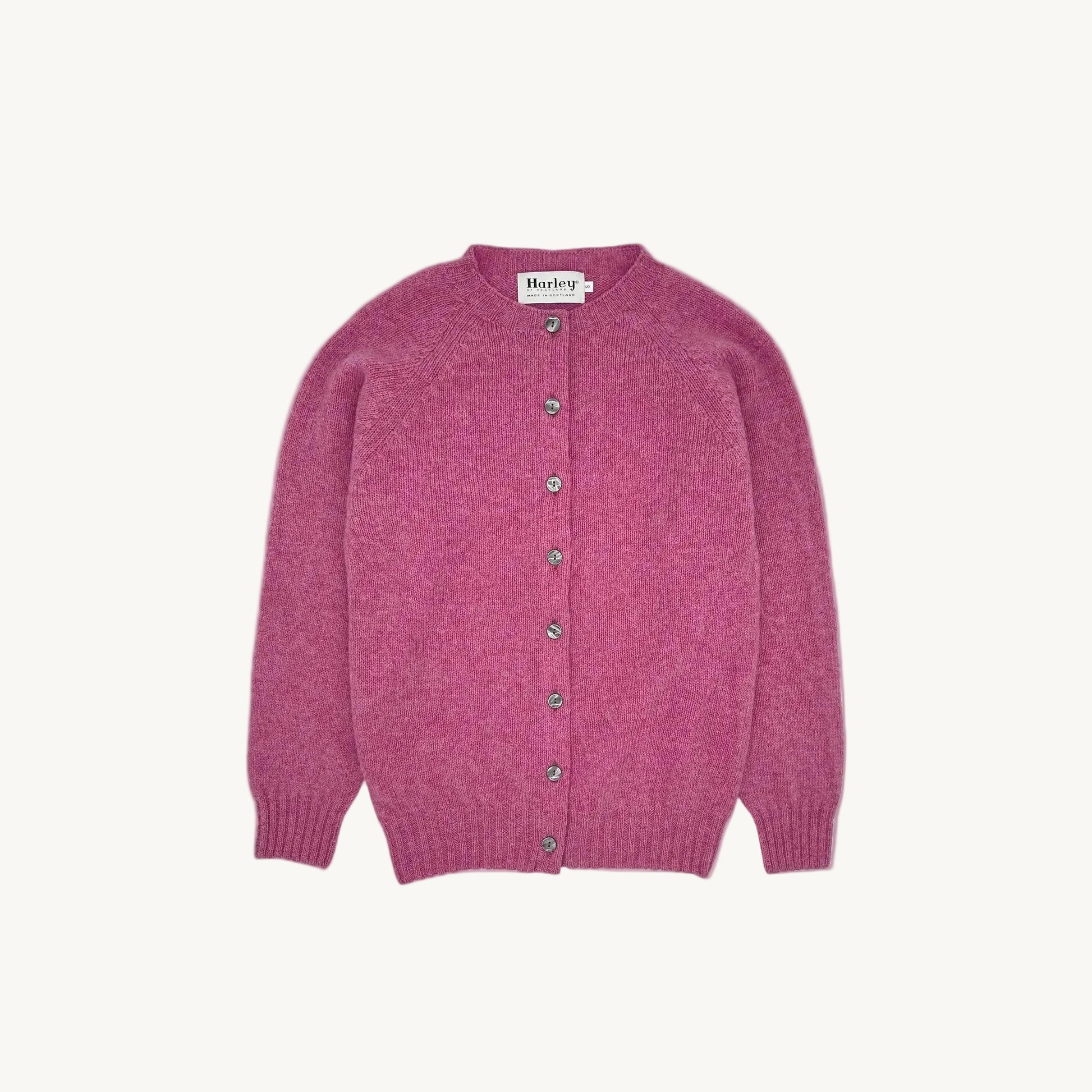 Flatbed image of Bosie Shetland Cardigan in Blush Pink