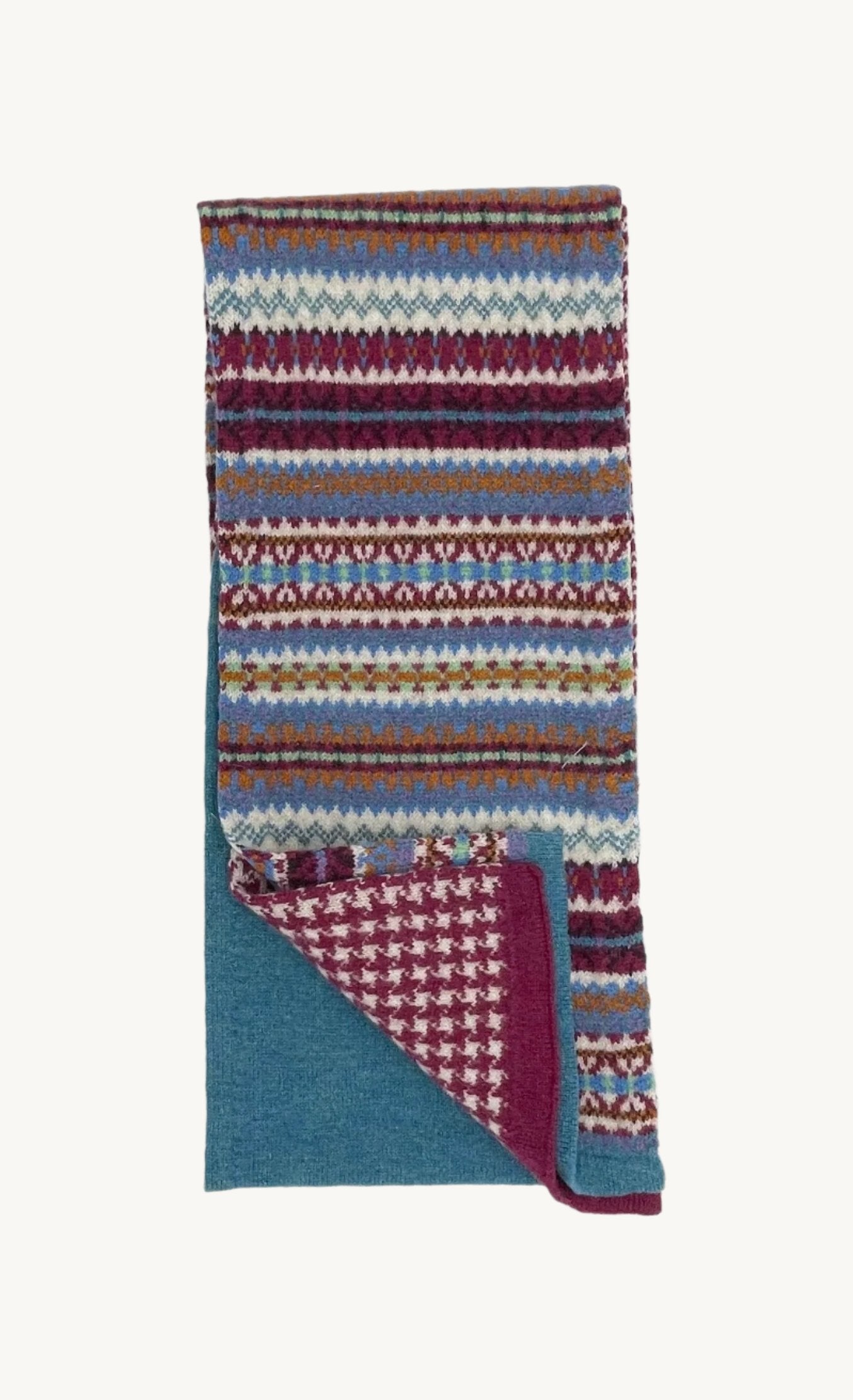 Flatbed Photograph of a Cruden Fairisle Lambswool Scarf in Azure Blue
