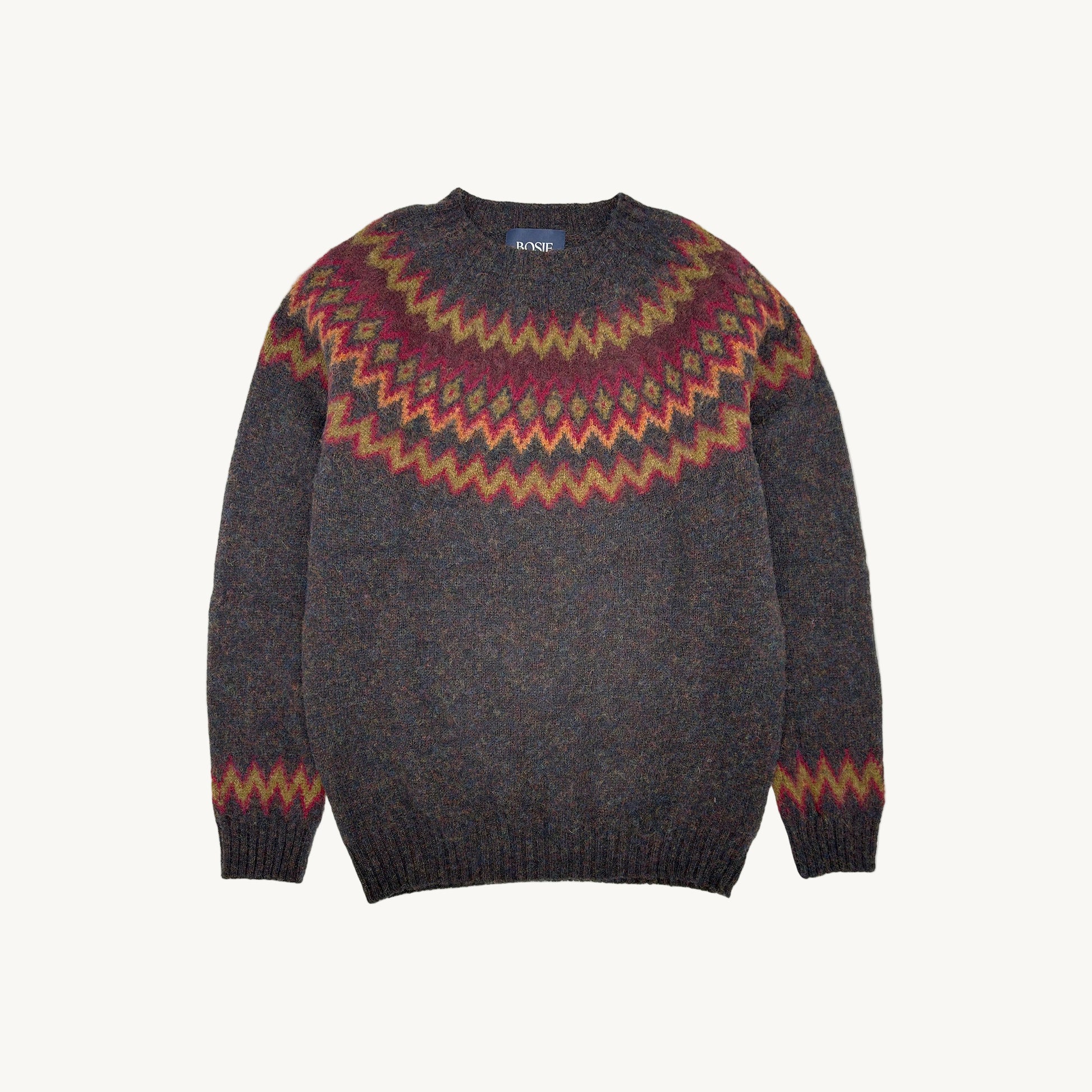 Flatbed photograph of a Bosie Knitwear Blue Mogganer Glacier brushed Nordic Fairisle Lambswool Sweater Jumper in colour Midnight Black.