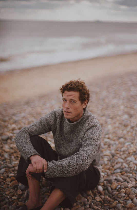 Man on beach wearing a Bosie Knitwear Blue Mogganer Whaler Sweater