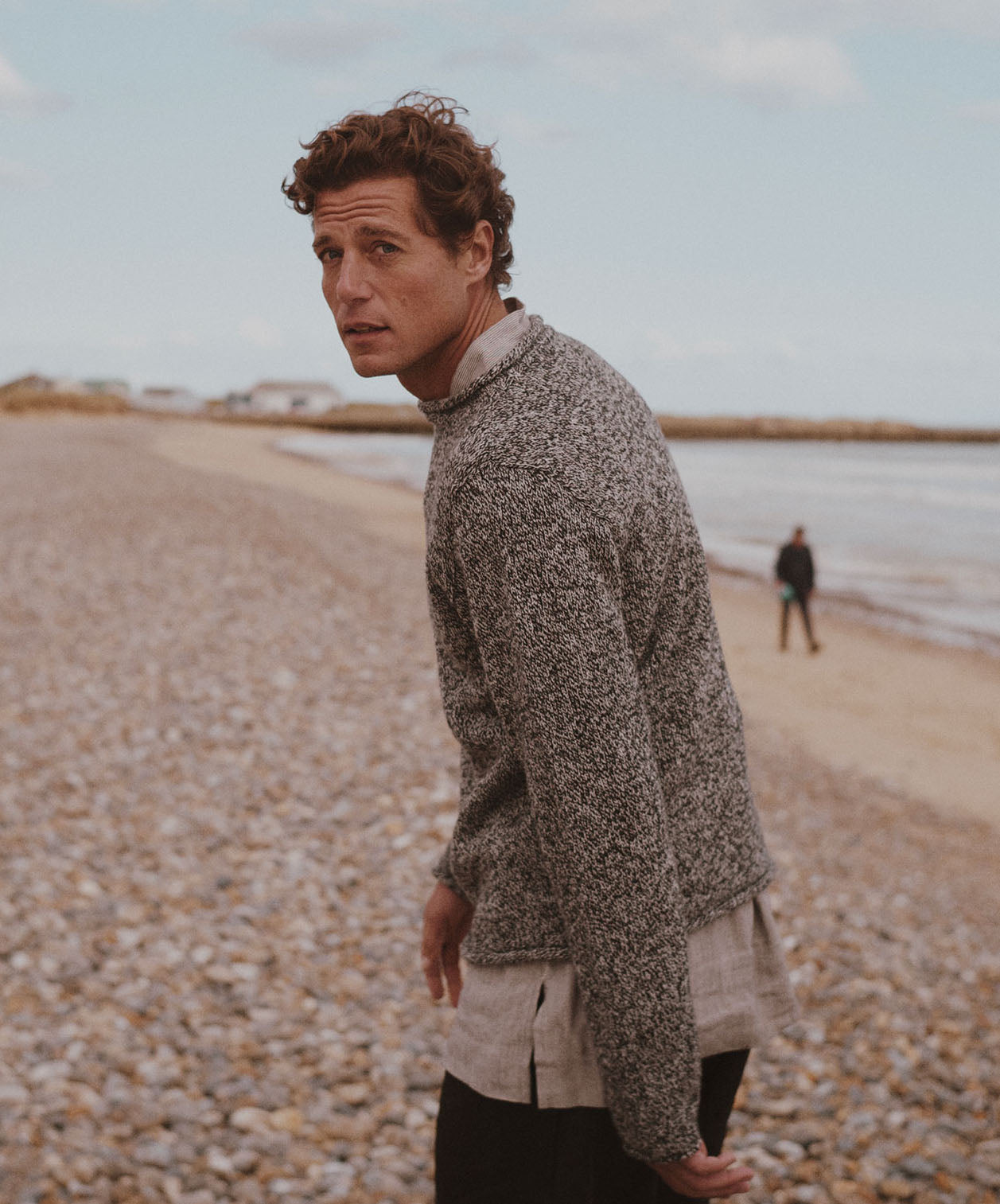 Man on beach wearing a Bosie Knitwear Blue Mogganer Whaler Sweater