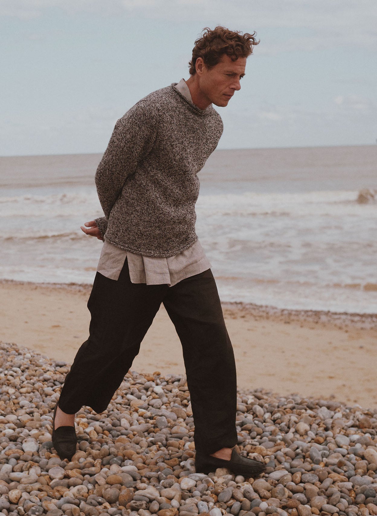 Man on beach wearing a Bosie Knitwear Blue Mogganer Whaler Sweater