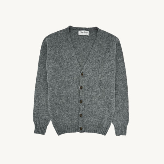 Man wearing the Bosie Harley of Scotland Shaggy Shetland V Cardigan in Med Grey