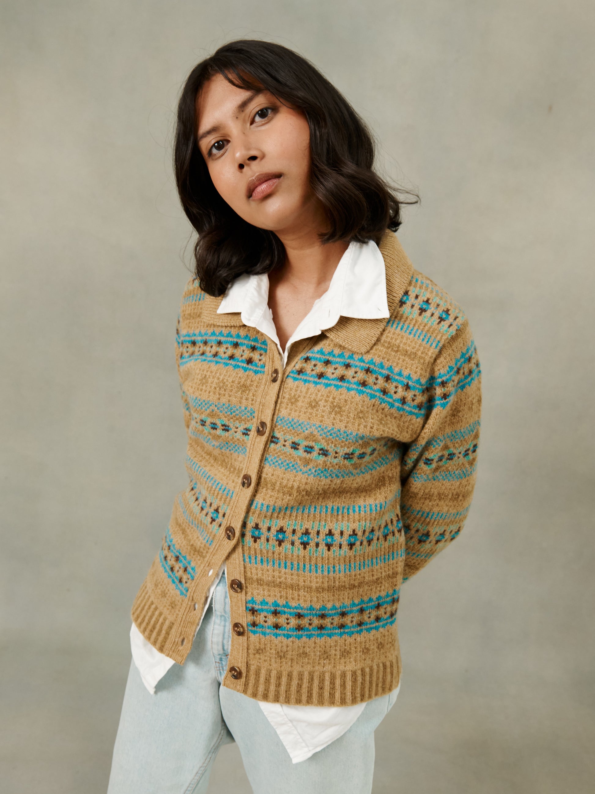 Woman wearing a Bosie Knitwear Autumn Crisp Gold Land Girl Cardigan