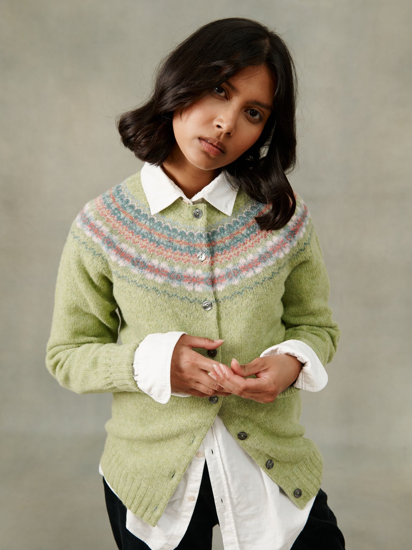 Woman wearing a Spring Meadow Green West Coast Cardigan