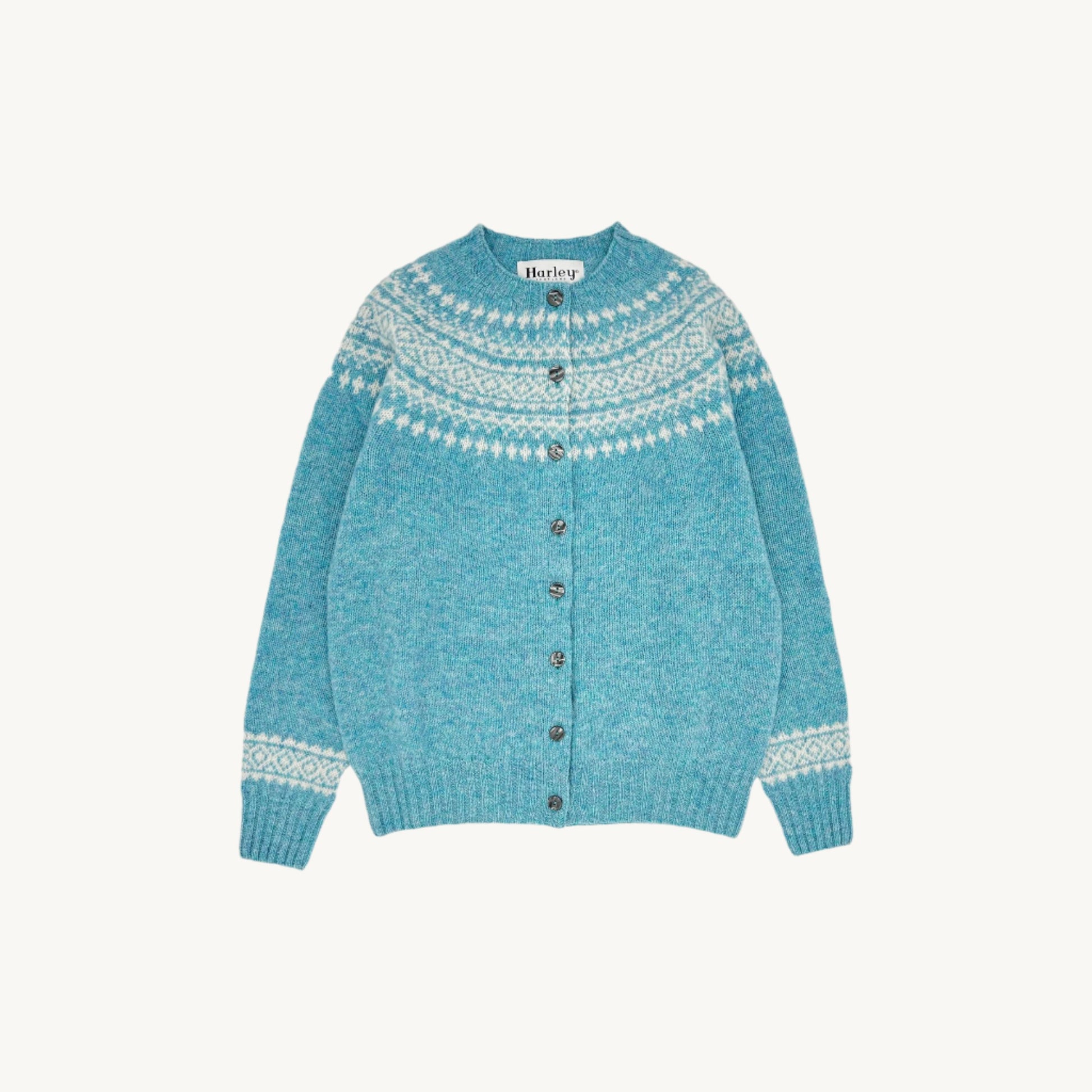 Woman wearing a duck egg blue Bosie Hara Lambswool Cardigan